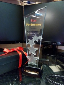 star performer kartik with the award