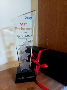 star performer kartik with the award and case